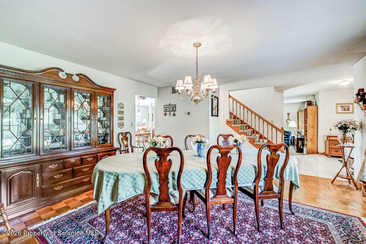 314 Reynolds Road Factoryville, PA 18419 - Photo 8 of 58 a view of a dining room with furniture window and outside view