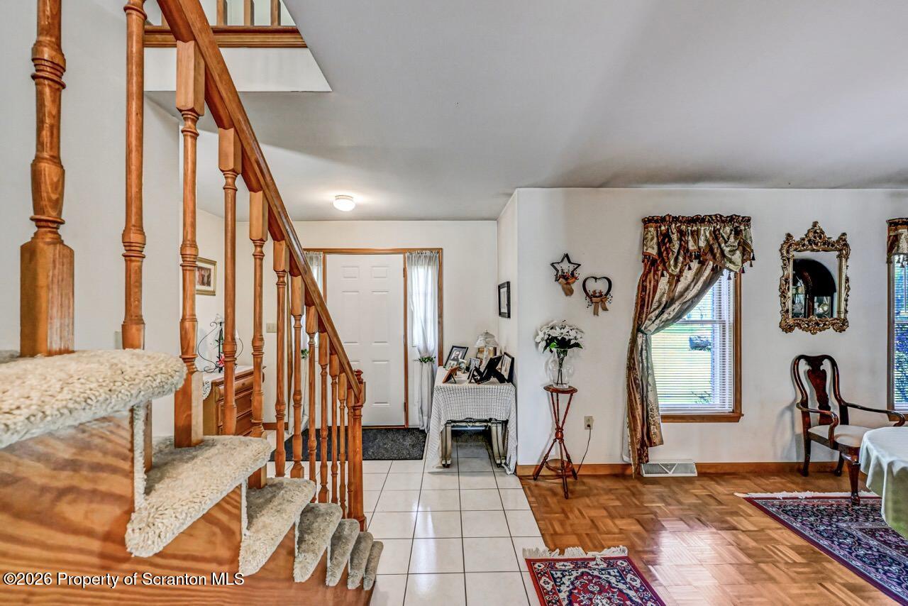 314 Reynolds Road Factoryville, PA 18419 - Photo 9 of 58 a view of an entryway with wooden floor and windows