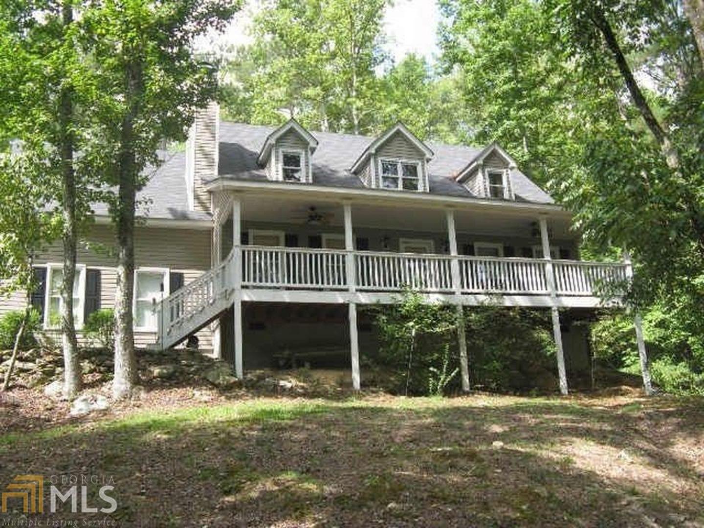 2324 Carr Road Northeast Conyers, GA 30012 - Photo 1 of 1 a front view of a house with a yard