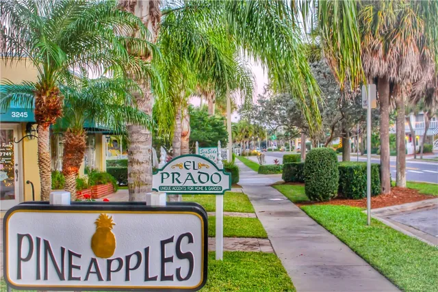 a view of outdoor space with signage and flags