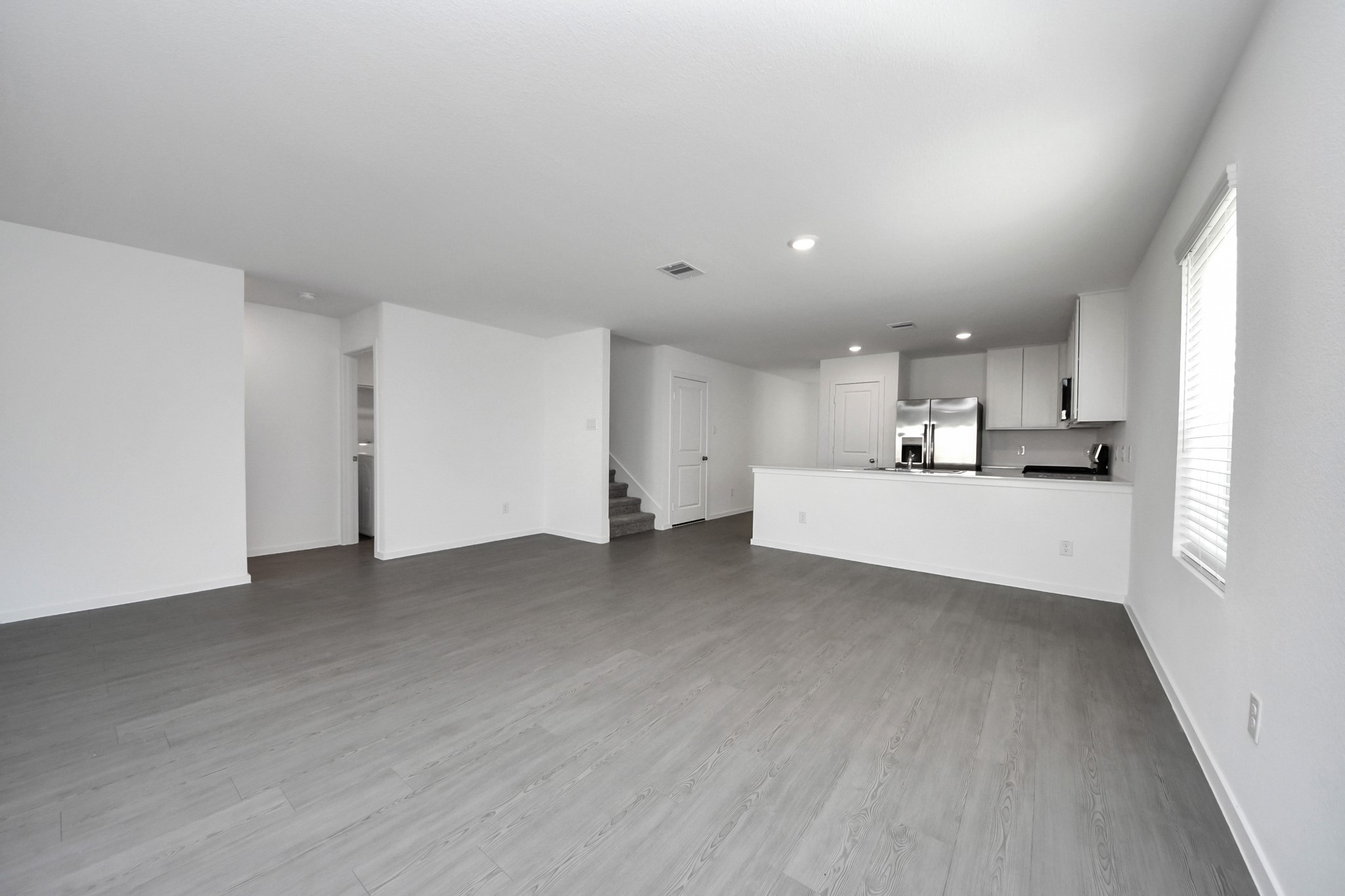 2523 Night Emerald Drive Rosharon, TX 77583 - Photo 11 of 42 a view of a kitchen with a sink and cabinet