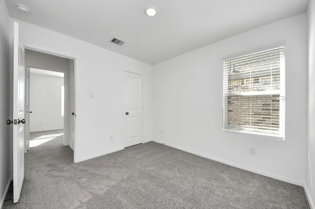 a view of a back yard of the house