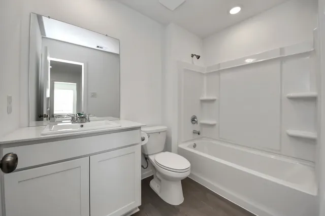 a view of swimming pool with outdoor seating