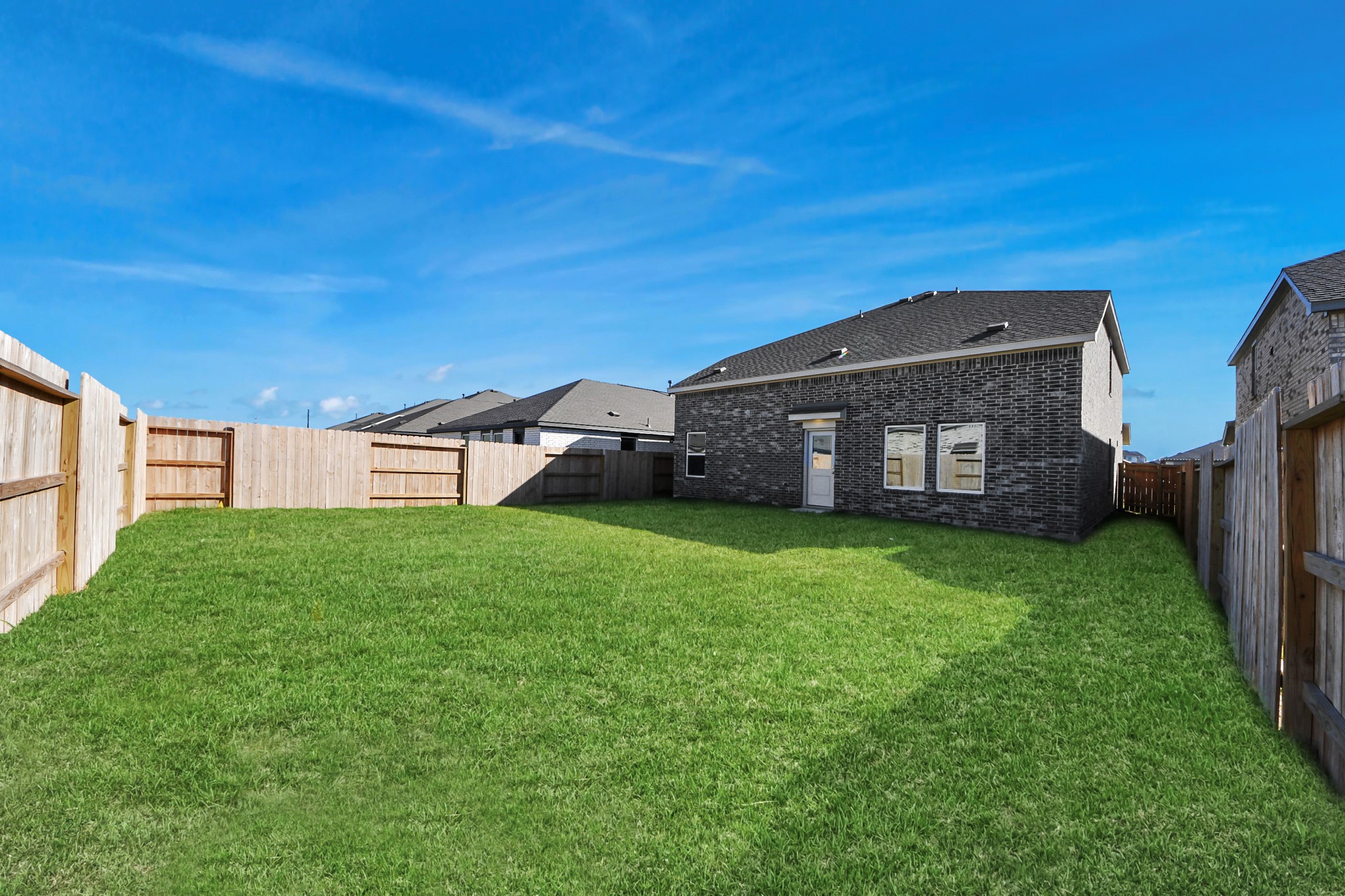2523 Night Emerald Drive Rosharon, TX 77583 - Photo 33 of 42 a view of a house with a back yard