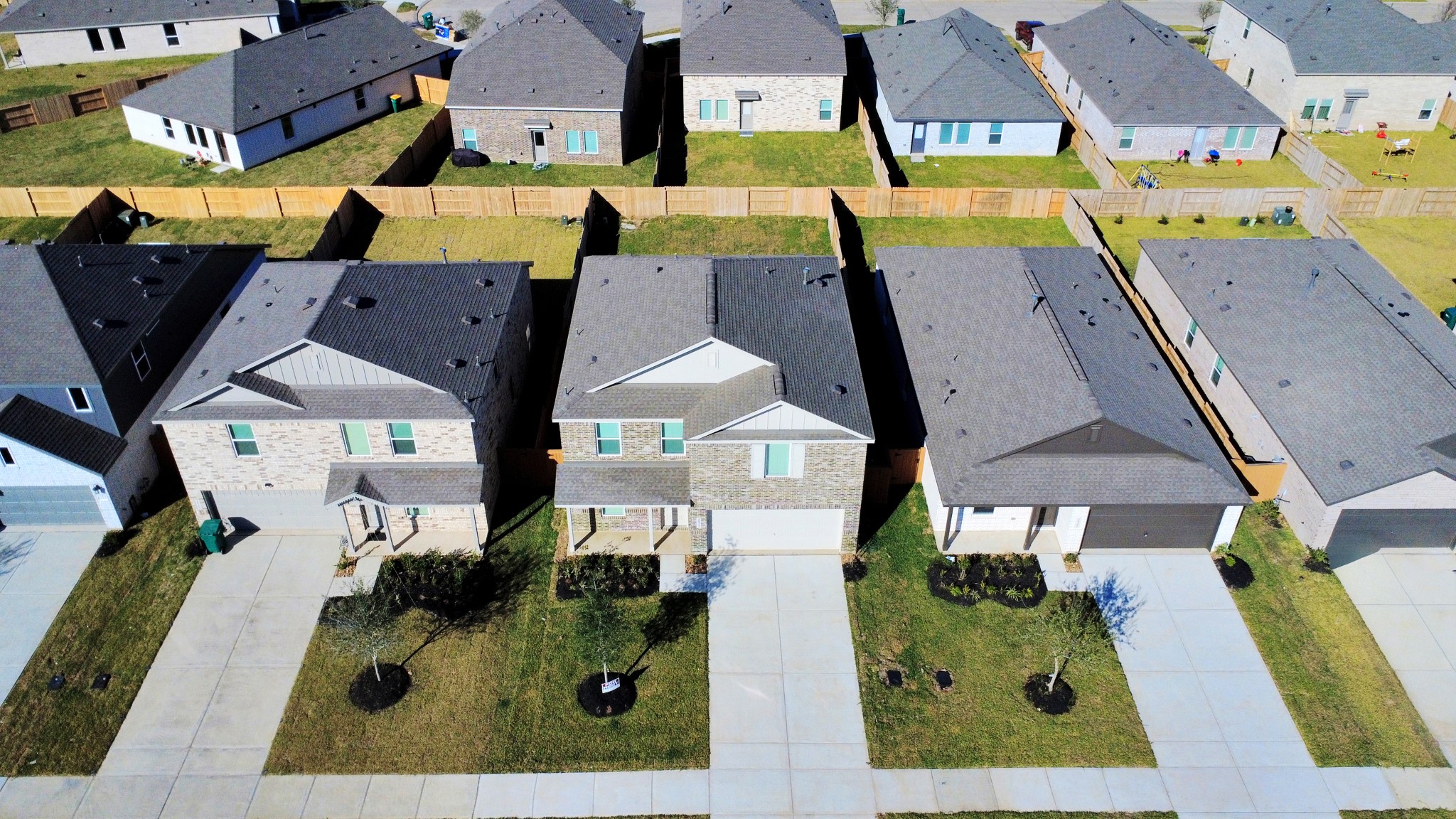 2523 Night Emerald Drive Rosharon, TX 77583 - Photo 36 of 42 an aerial view of residential houses with outdoor space and swimming pool