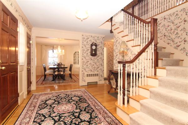 64 Myopia Road Winchester, MA 01890 - Photo 3 of 30 a view of entryway livingroom and hall with wooden floor