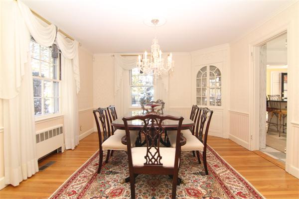 64 Myopia Road Winchester, MA 01890 - Photo 4 of 30 a view of a dining room with furniture window and wooden floor