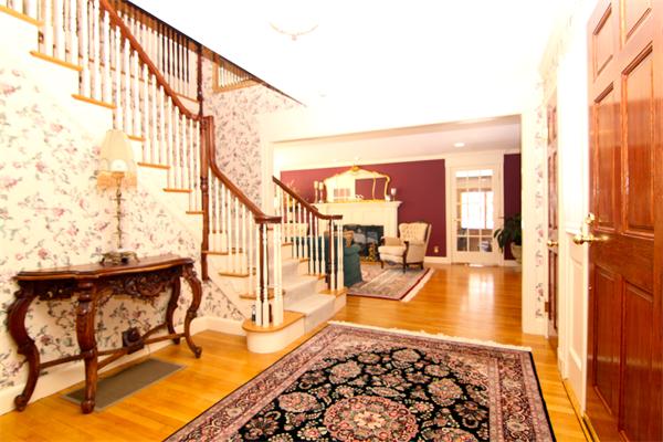 64 Myopia Road Winchester, MA 01890 - Photo 5 of 30 a view of a living room and a balcony with furniture