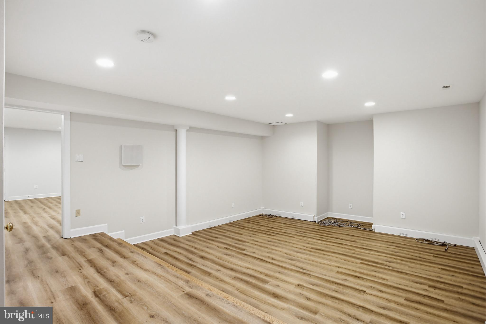 11316 Bright Pond Lane Reston, VA 20194 - Photo 34 of 48 Media room with step down elevation