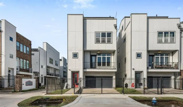 a view of a street with buildings