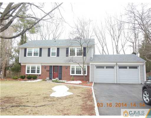 29 Hughes Road Somerset, NJ 08873 - Photo 2 of 19 a front view of a house with a yard