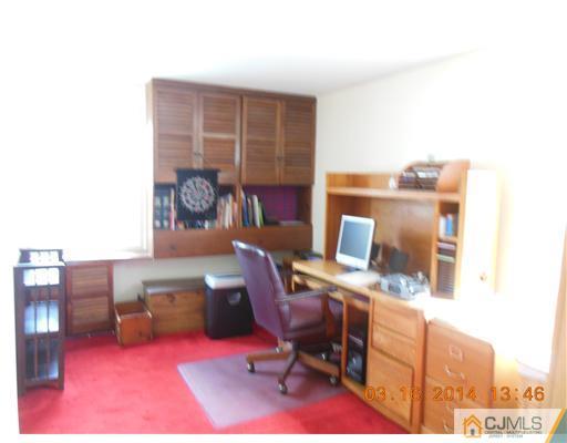 29 Hughes Road Somerset, NJ 08873 - Photo 14 of 19 a workspace with furniture and a window