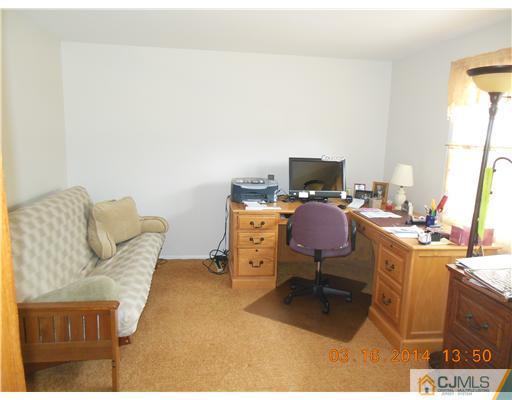 29 Hughes Road Somerset, NJ 08873 - Photo 16 of 19 a view of workspace with lounge chair