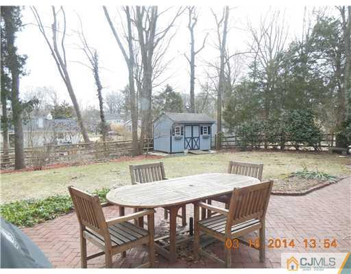 29 Hughes Road Somerset, NJ 08873 - Photo 3 of 19 a view of a chairs and table on the patio