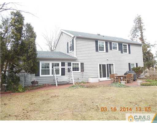 29 Hughes Road Somerset, NJ 08873 - Photo 4 of 19 a front view of a house with a yard