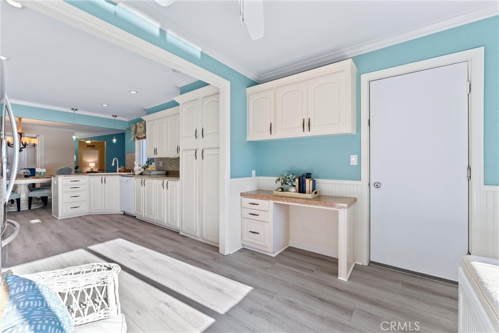2529 Shadow Santa Ana, CA 92705 - Photo 18 of 45 a view of kitchen with wooden floor and electronic appliances