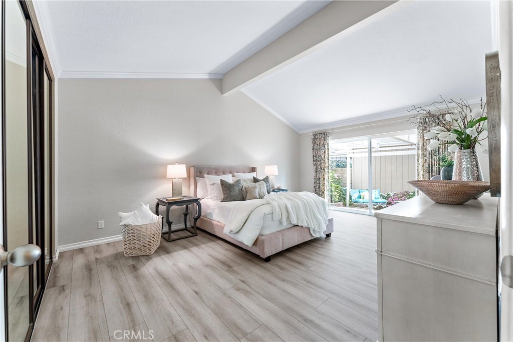 2529 Shadow Santa Ana, CA 92705 - Photo 23 of 45 a bedroom with a bed and large window