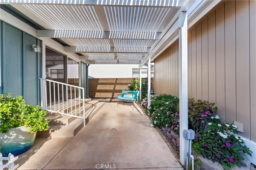 2529 Shadow Santa Ana, CA 92705 - Photo 33 of 45 a view of a porch with a flower garden