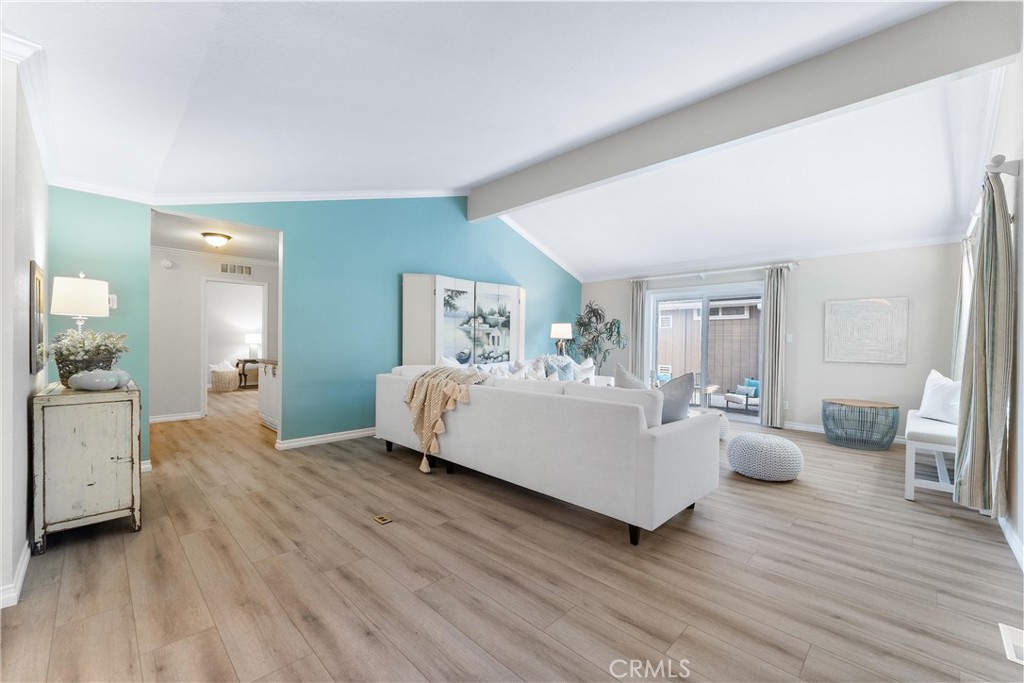 2529 Shadow Santa Ana, CA 92705 - Photo 6 of 45 a living room with furniture and a wooden floor