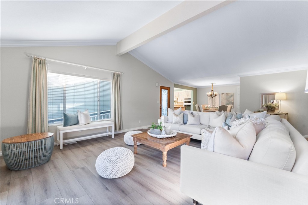 2529 Shadow Santa Ana, CA 92705 - Photo 8 of 45 a living room with furniture and a wooden floor