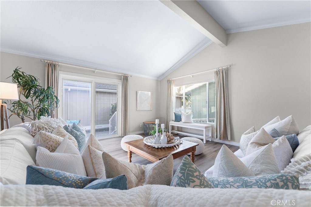 2529 Shadow Santa Ana, CA 92705 - Photo 9 of 45 a living room with furniture and a large window