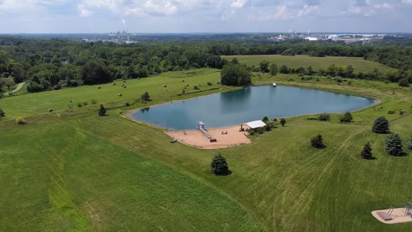 a view of a lake with a yard