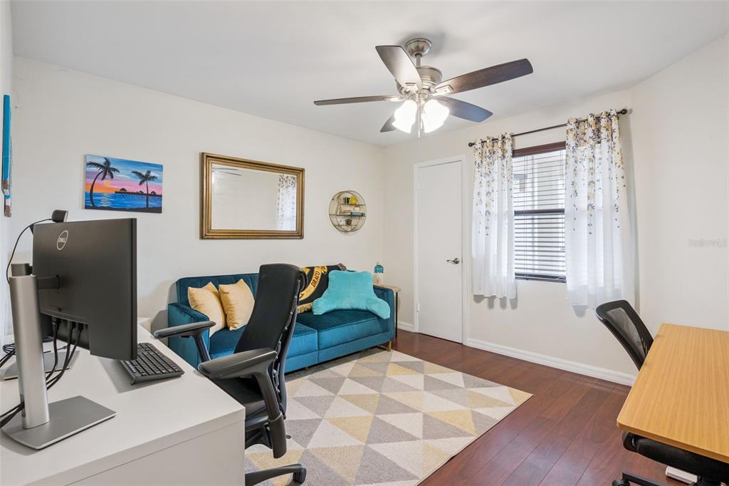 3032 Parkway Boulevard, Unit 305 Kissimmee, FL 34747 - Photo 13 of 40 a living room with furniture and a window