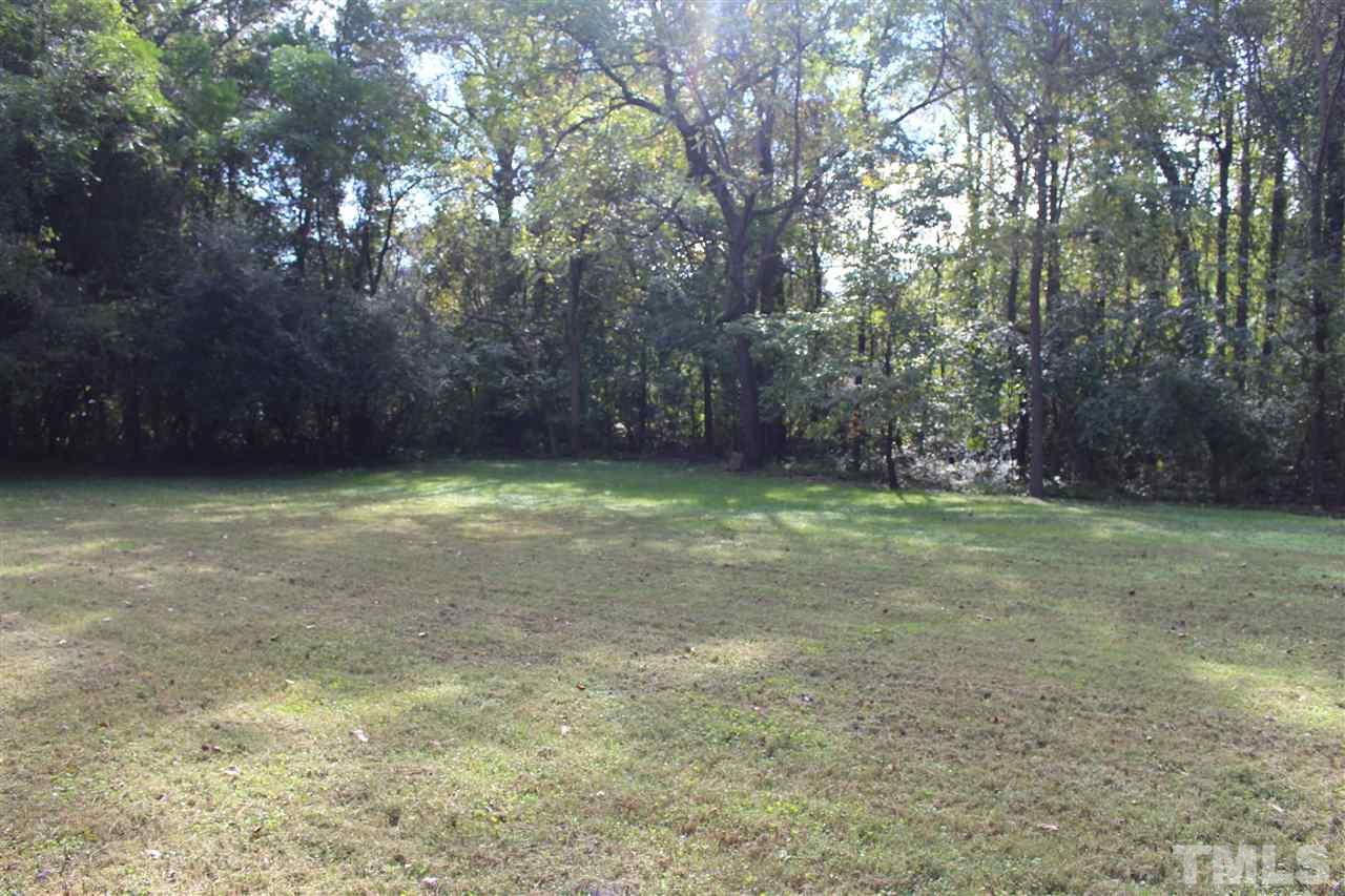 6424 Litchford Road Raleigh, NC 27615 - Photo 8 of 8 a view of a yard with a tree