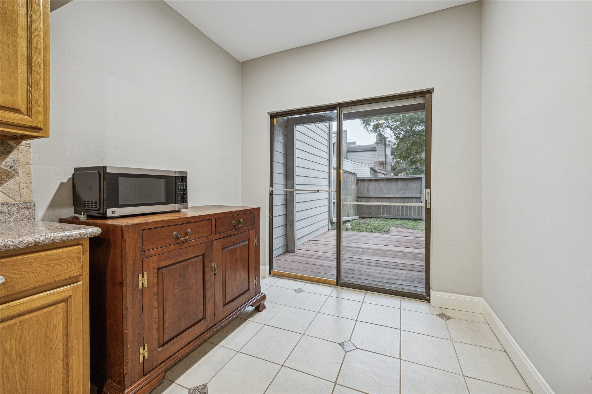 1615 Prairie Mark Lane Houston, TX 77077 - Photo 11 of 25 And here you can see where the grill goes! And an outdoor table.