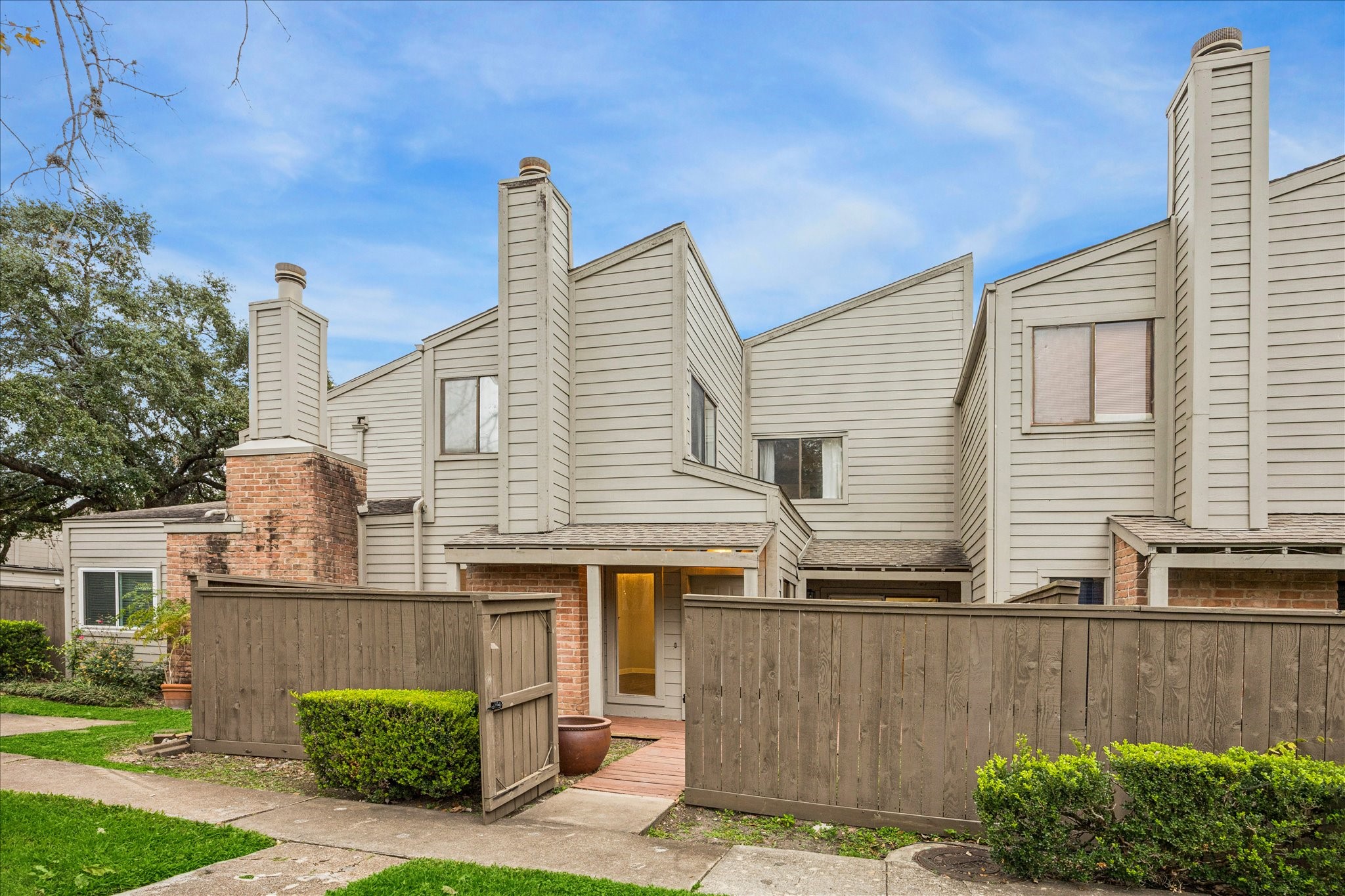1615 Prairie Mark Lane Houston, TX 77077 - Photo 3 of 25 And a closer view entering the front gate.