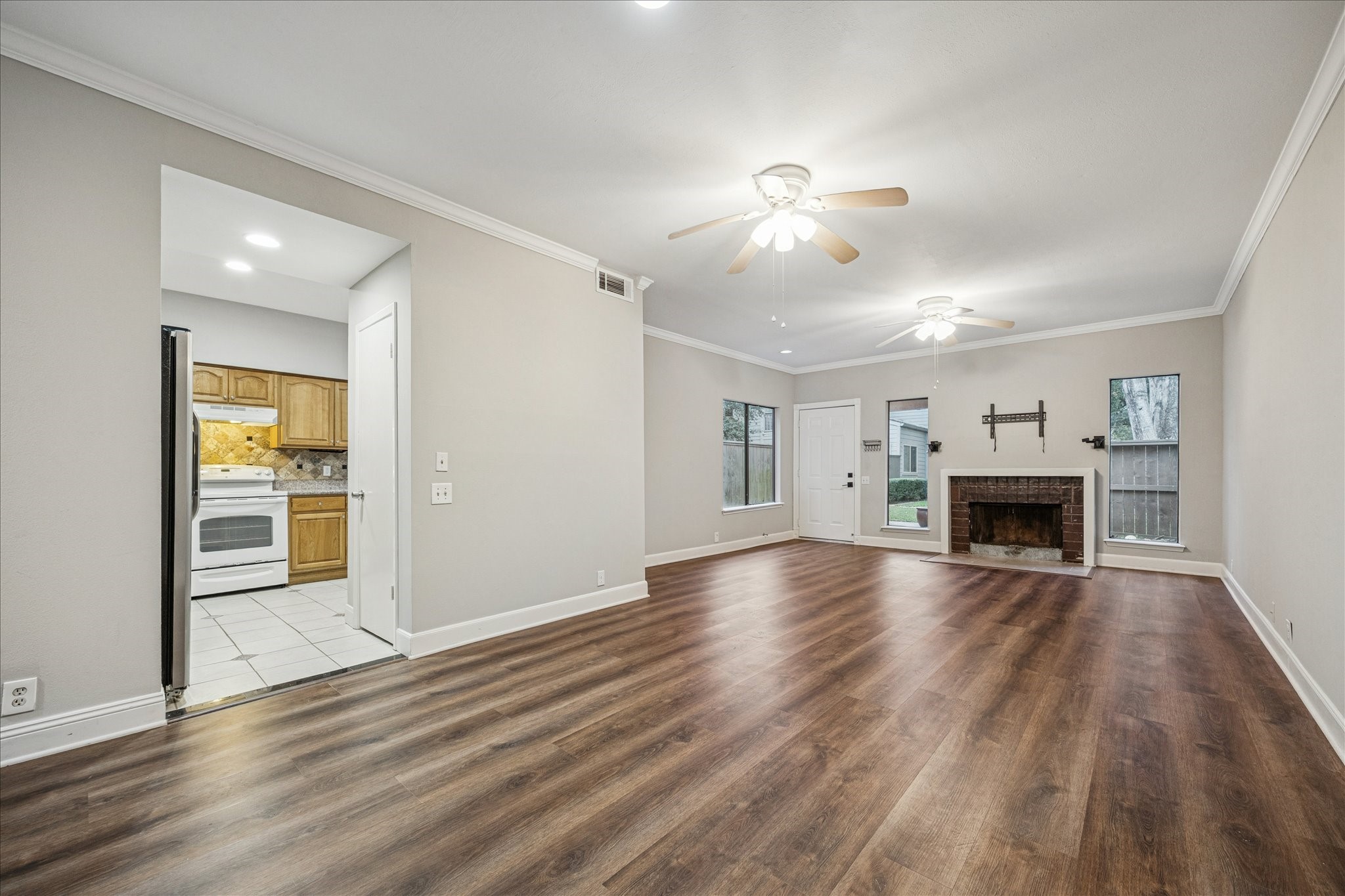 1615 Prairie Mark Lane Houston, TX 77077 - Photo 8 of 25 And another view with this one looking into the kitchen. This huge living/dining room is fantastic for hosting family and friend gatherings.