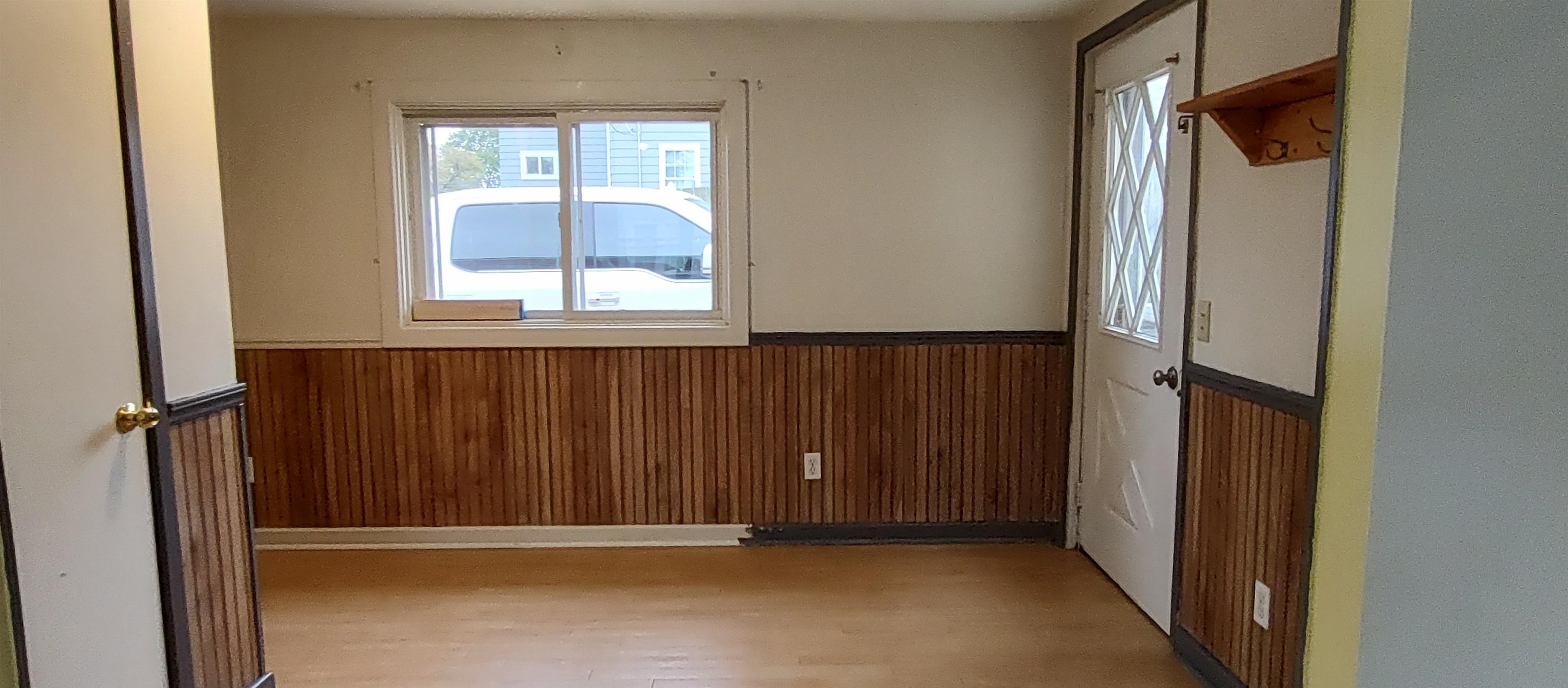 1027 Garfield Avenue Belvidere, IL 61008 - Photo 11 of 21 a view of an empty room with a window
