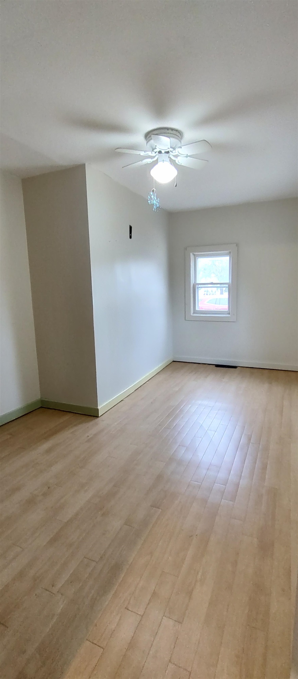 1027 Garfield Avenue Belvidere, IL 61008 - Photo 18 of 21 an empty room with a empty space and windows