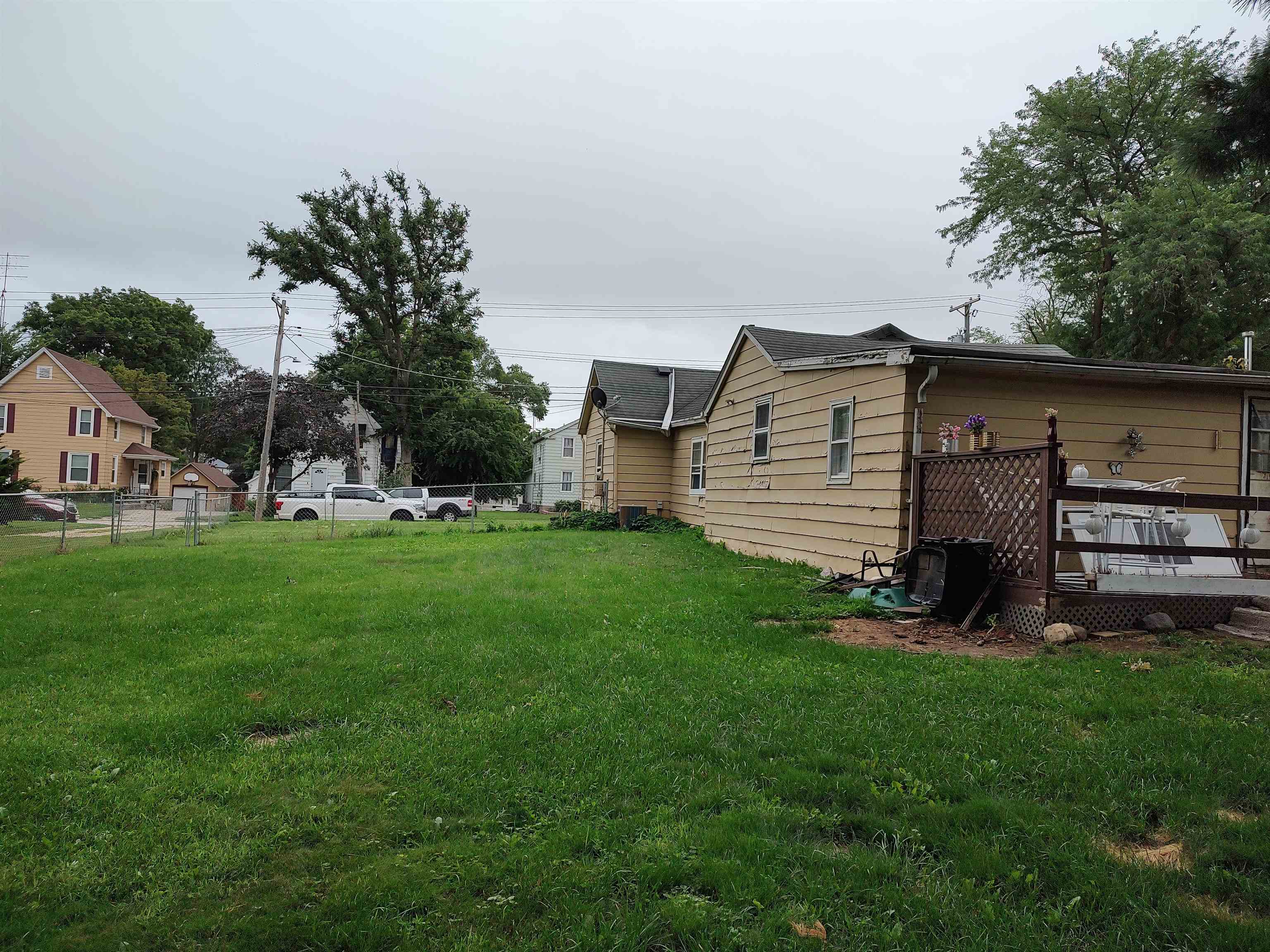 1027 Garfield Avenue Belvidere, IL 61008 - Photo 9 of 21 a view of a house with a yard and sitting area