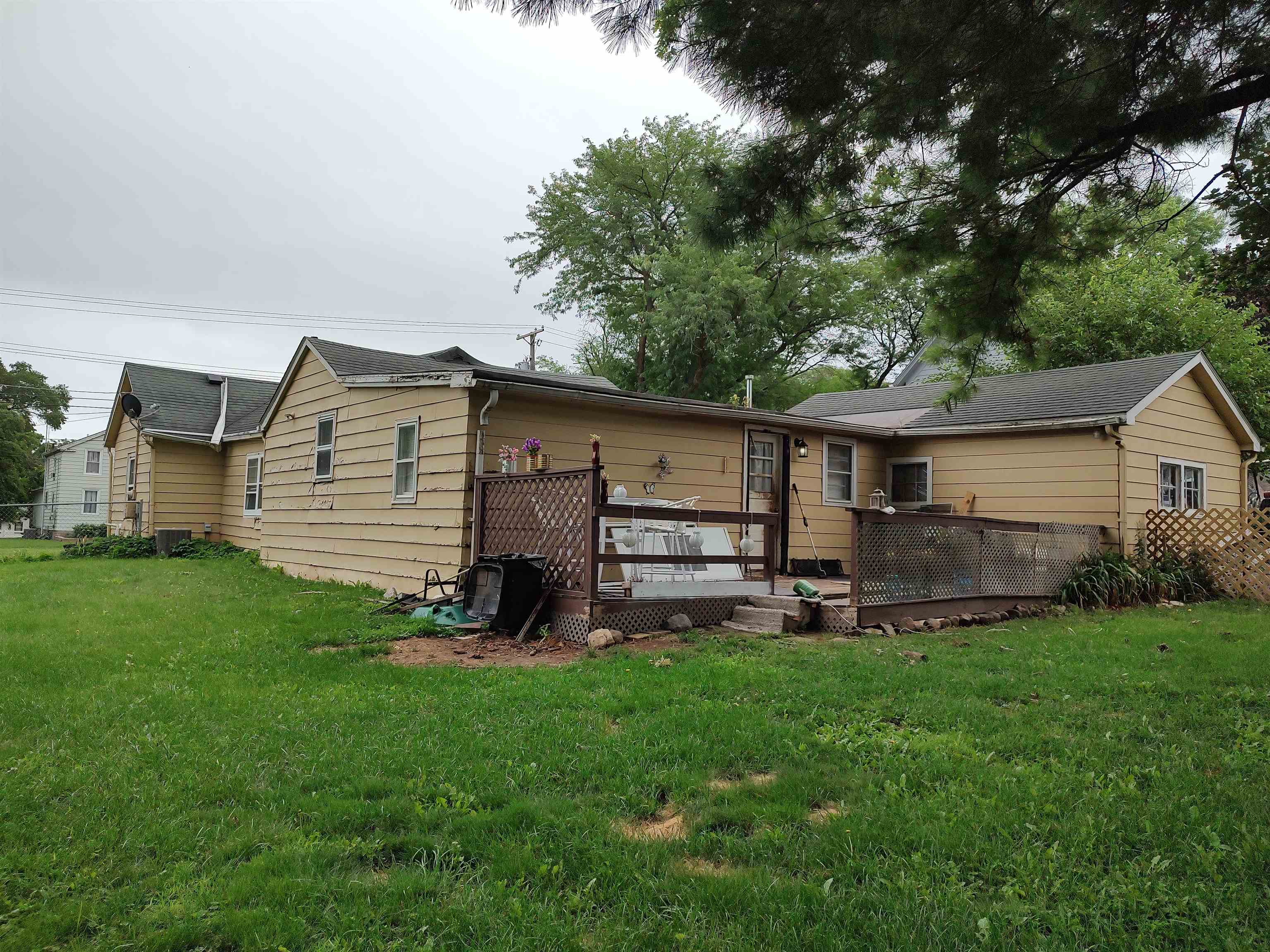 1027 Garfield Avenue Belvidere, IL 61008 - Photo 10 of 21 a view of a house with a yard and sitting area