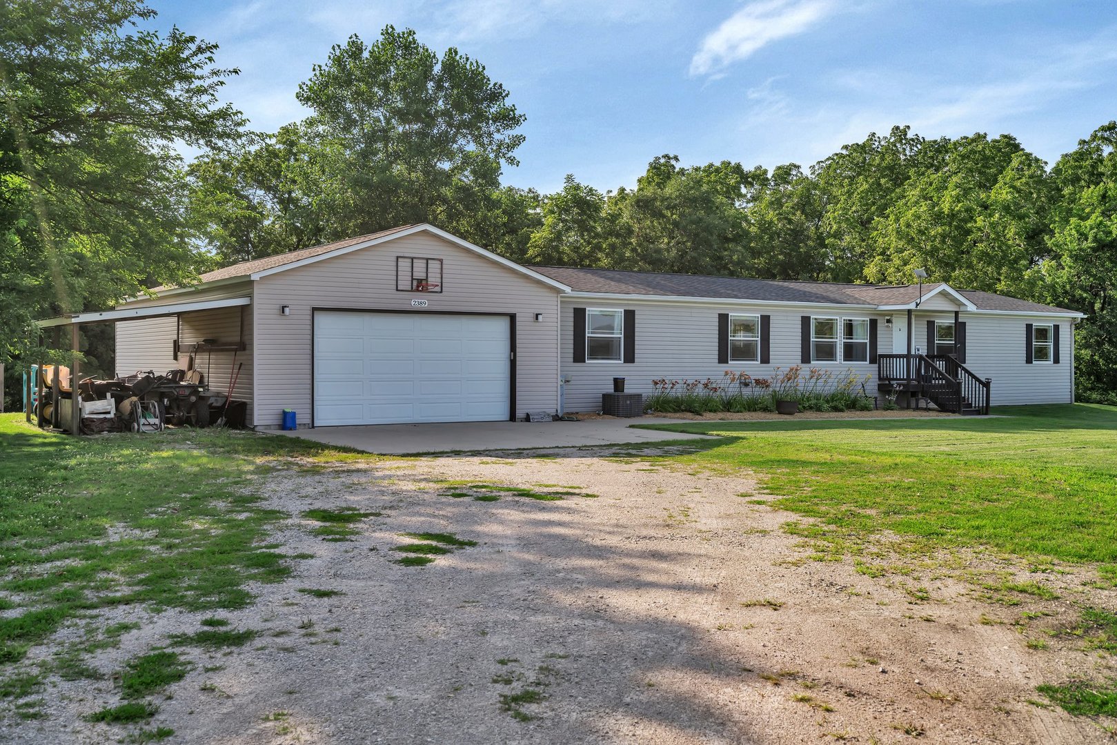 2389 East 29th Road Seneca, IL 61360 - Photo 4 of 46 a house view with a garden space