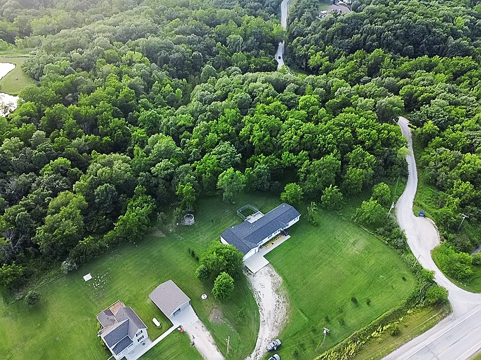 2389 East 29th Road Seneca, IL 61360 - Photo 46 of 46 an aerial view of a residential houses with outdoor space and trees
