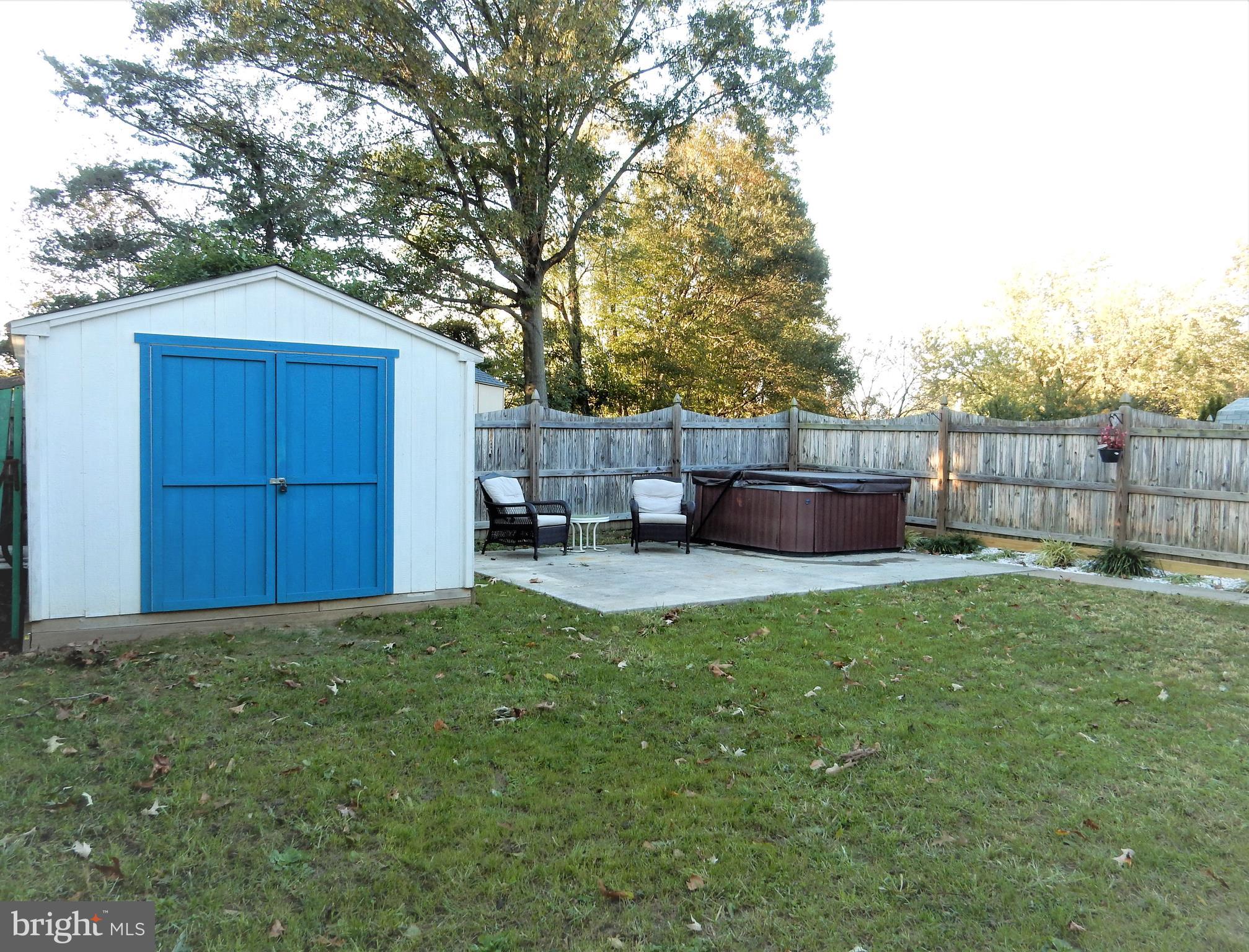 306 Oakwood Road Edgewater, MD 21037 - Photo 21 of 36 a view of backyard with seating and green space