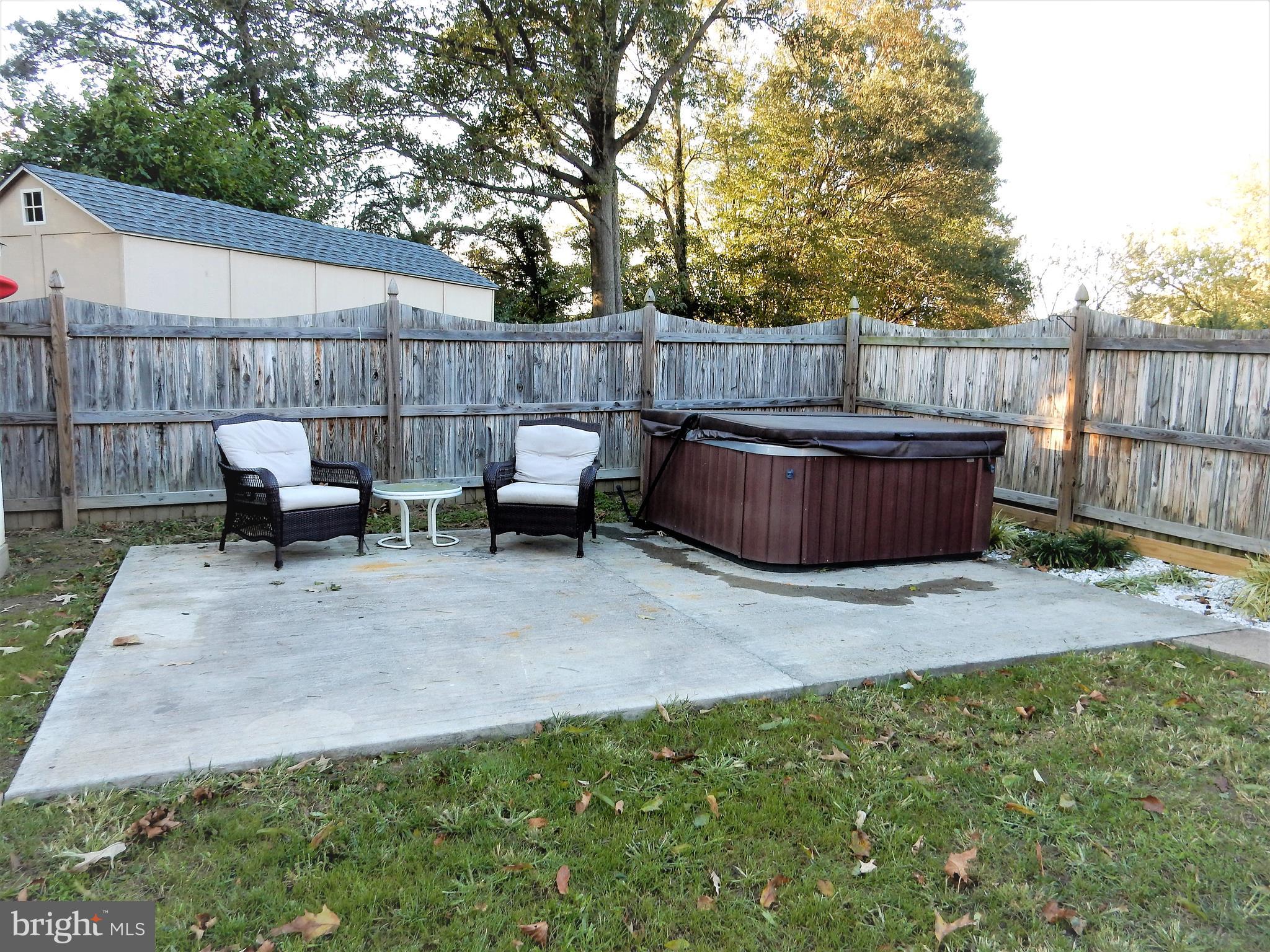 306 Oakwood Road Edgewater, MD 21037 - Photo 22 of 36 a view of backyard with outdoor seating