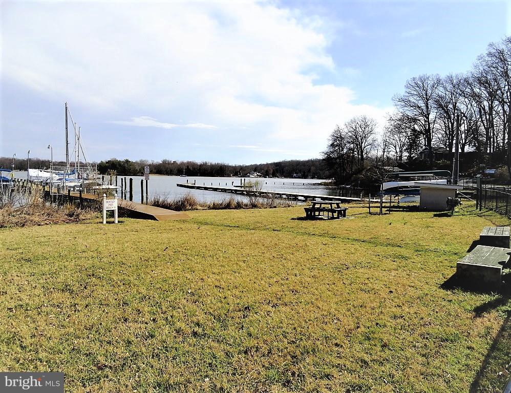 306 Oakwood Road Edgewater, MD 21037 - Photo 35 of 36 a view of a lake with houses