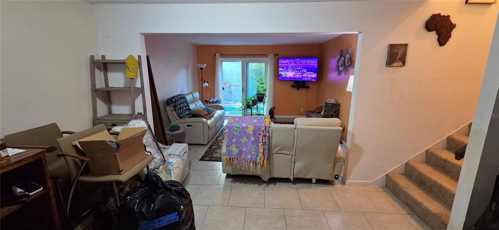 165 Pine Cone Trail Ormond Beach, FL 32174 - Photo 12 of 25 a living room with furniture and a couch