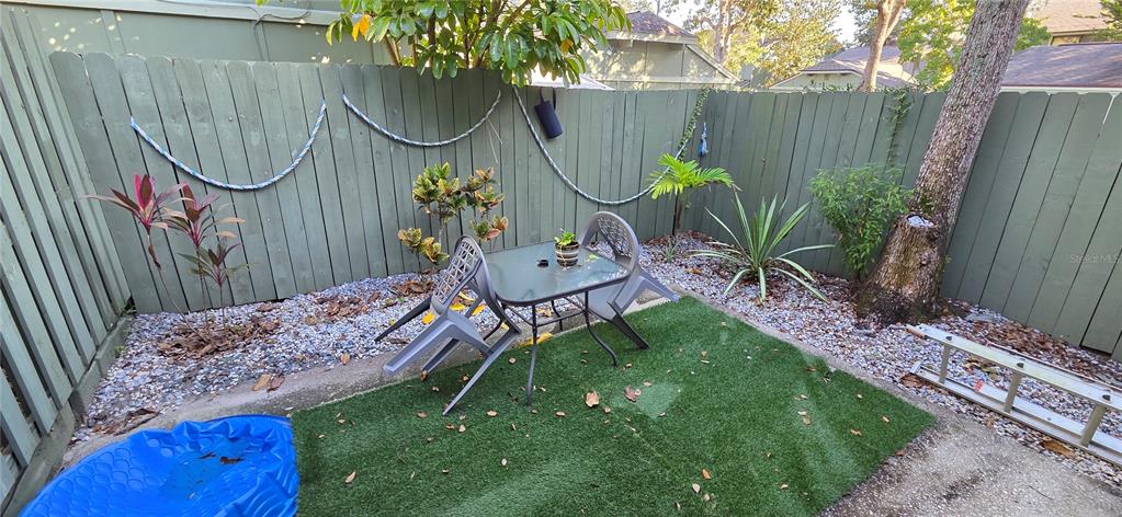 165 Pine Cone Trail Ormond Beach, FL 32174 - Photo 24 of 25 a garden view with a seating space