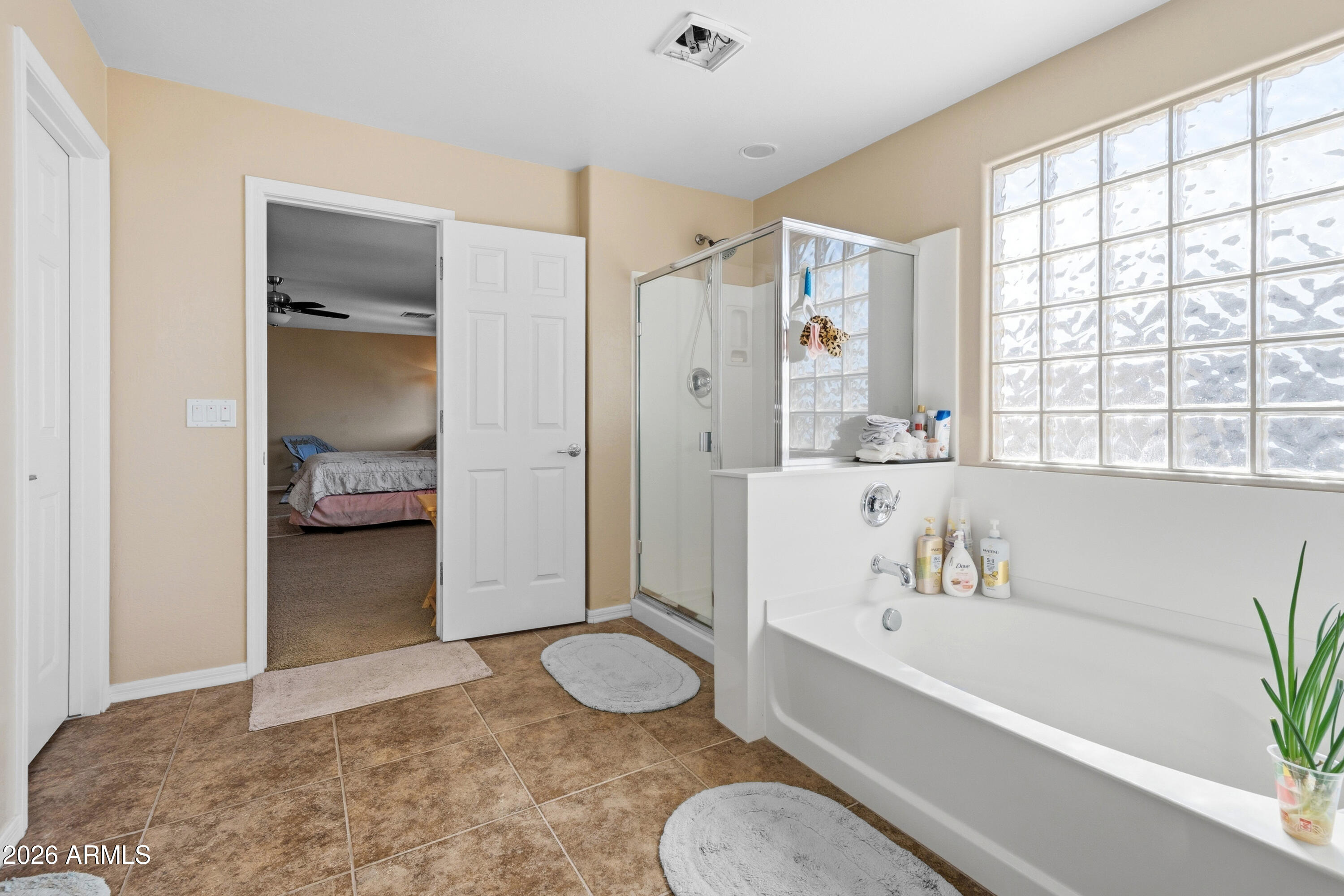 7639 West Georgetown Way Florence, AZ 85132 - Photo 14 of 25 a bathroom with a tub sink and a mirror