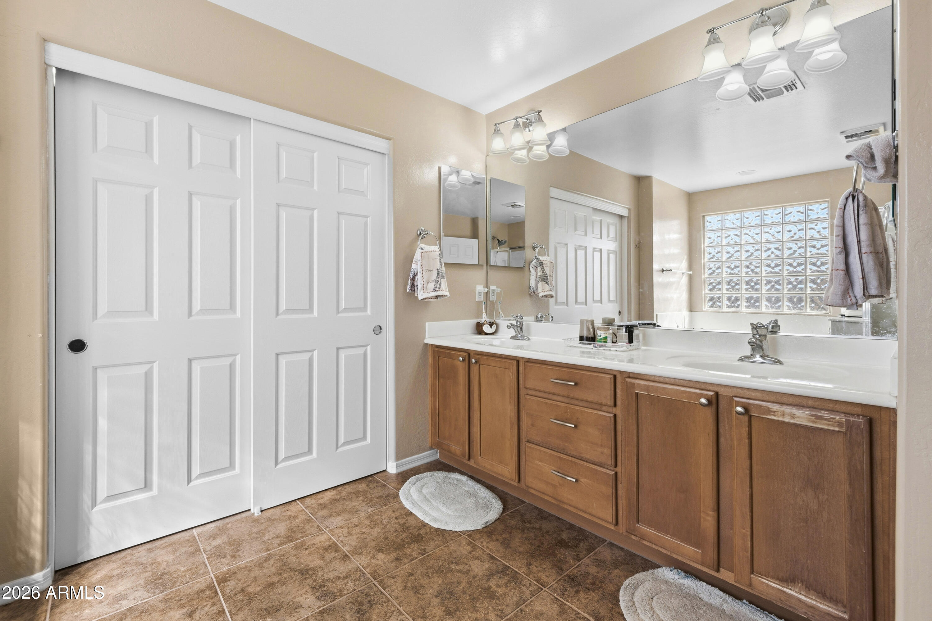 7639 West Georgetown Way Florence, AZ 85132 - Photo 15 of 25 a bathroom with a granite countertop sink mirror and with shower