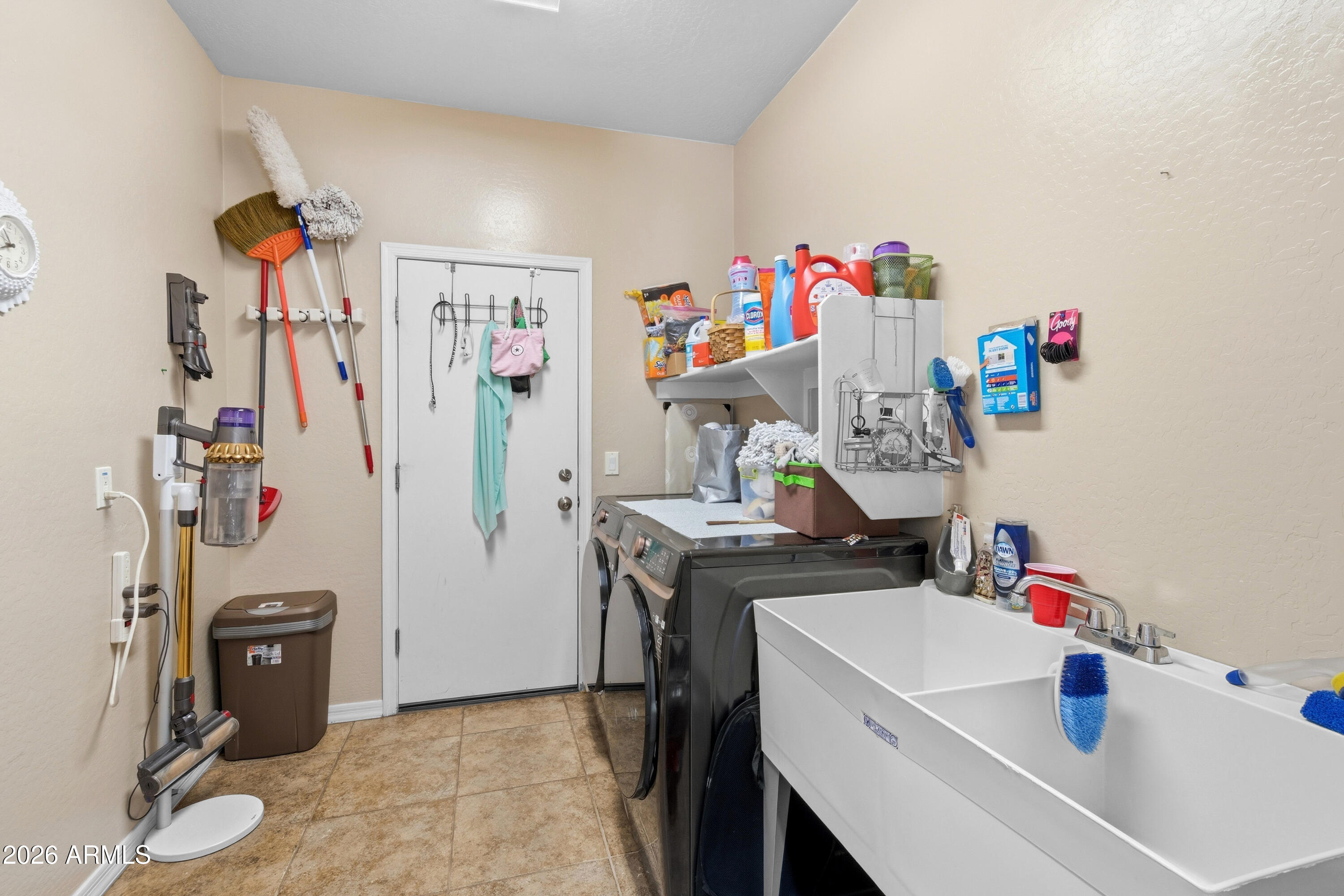 7639 West Georgetown Way Florence, AZ 85132 - Photo 22 of 25 a room with storage and utility