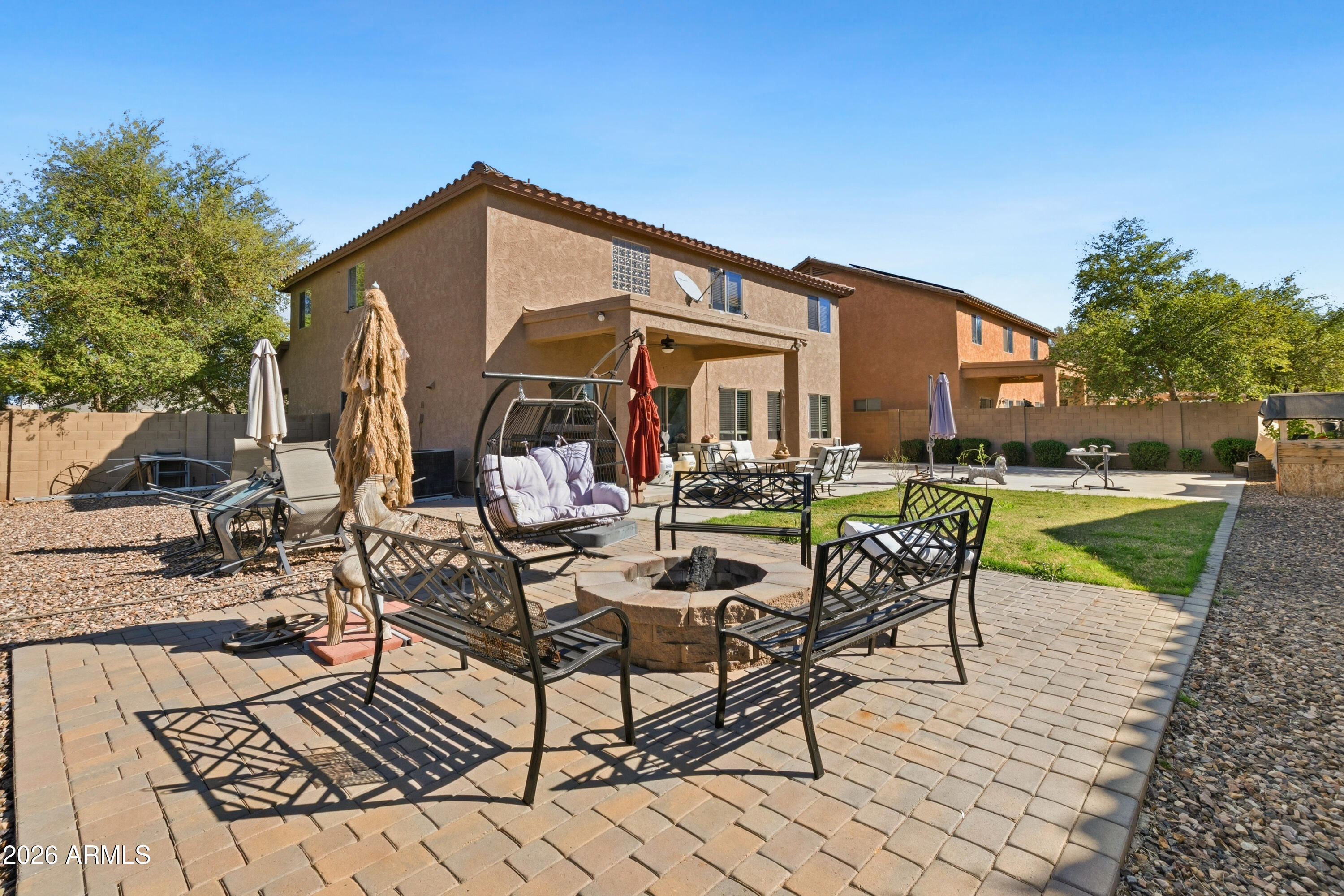 7639 West Georgetown Way Florence, AZ 85132 - Photo 23 of 25 a view of a house with swimming pool and sitting area