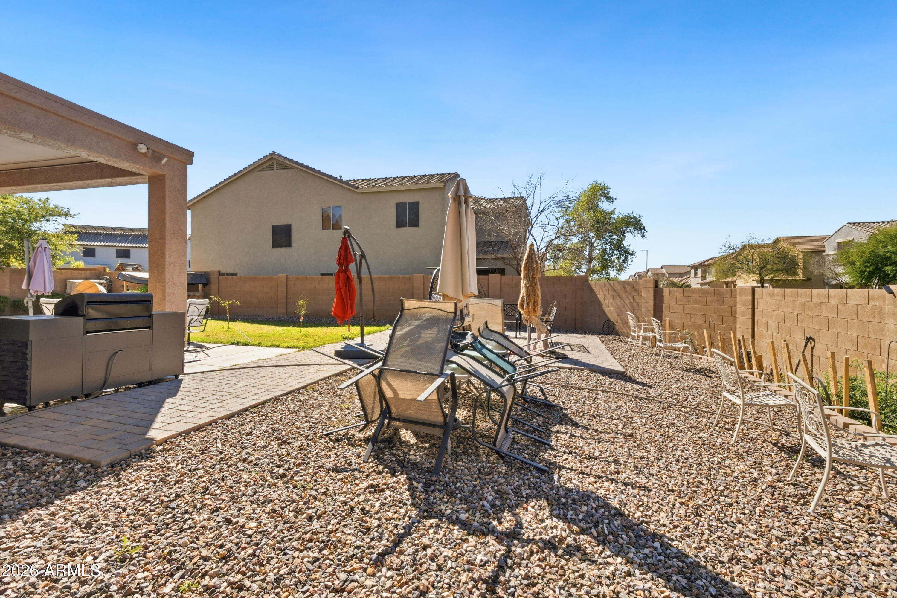 7639 West Georgetown Way Florence, AZ 85132 - Photo 24 of 25 a view of a backyard with swimming pool