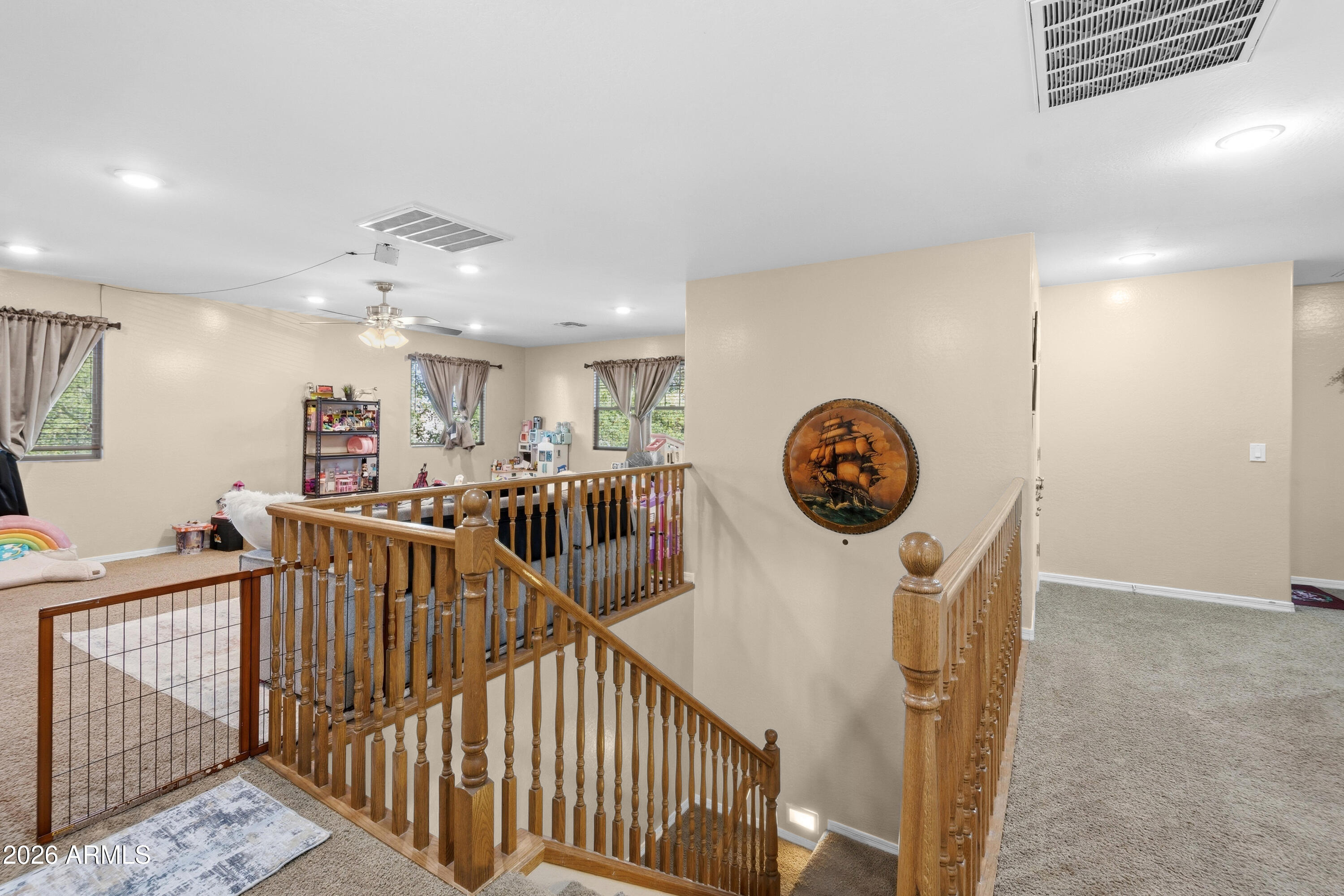7639 West Georgetown Way Florence, AZ 85132 - Photo 10 of 25 a view of a hallway with seating area