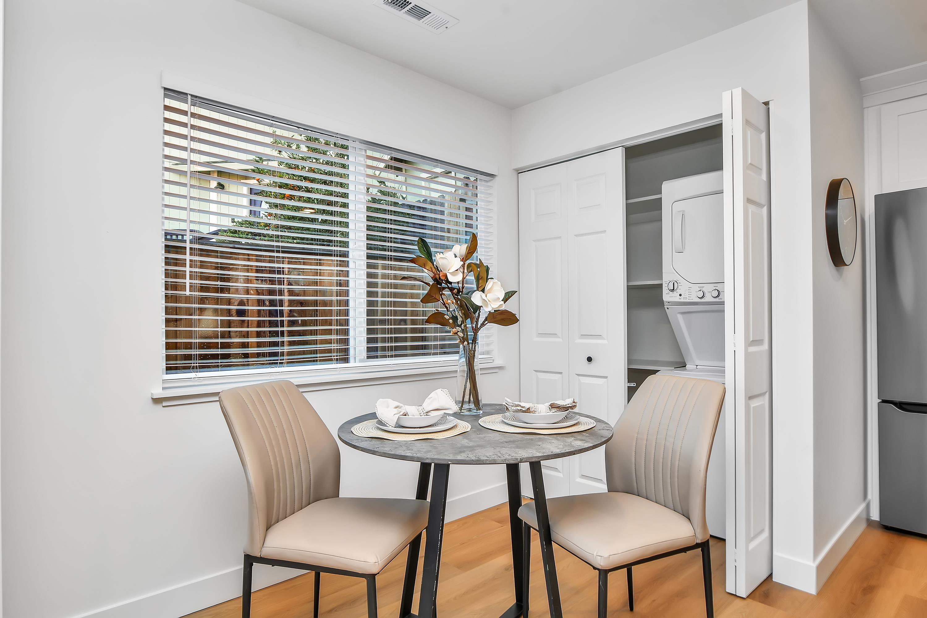 1351 Shell Avenue Martinez, CA 94553 - Photo 17 of 29 Dining space featuring stacked washing machine and dryer and light wood finished floors