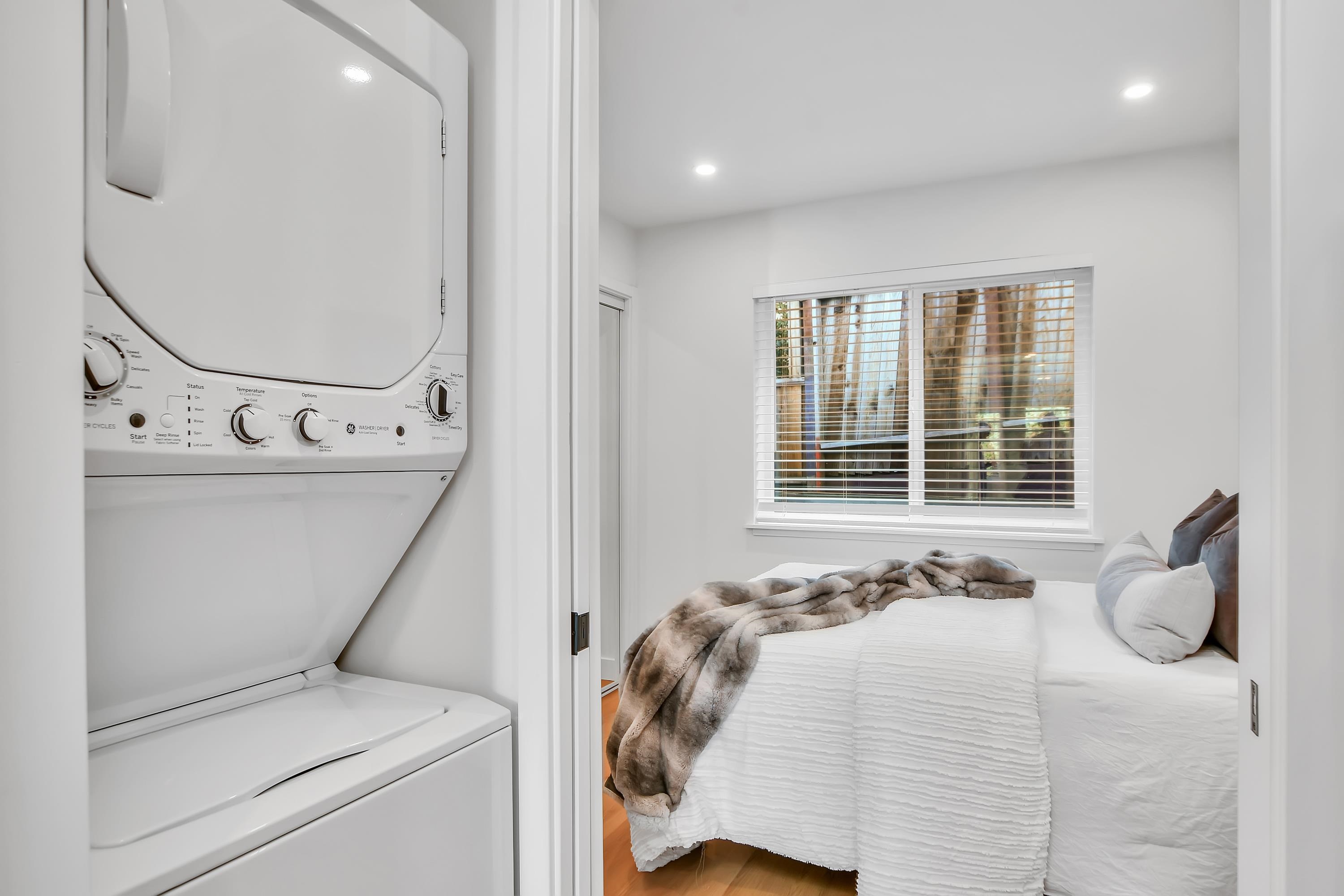 1351 Shell Avenue Martinez, CA 94553 - Photo 23 of 29 Laundry room with stacked washer / drying machine, recessed lighting, and wood finished floors